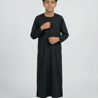 Colorful kids' kaftan by AL-ANDALUS featuring vibrant patterns and comfortable fabric, designed for young children.