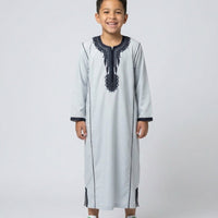 Colorful kids' kaftan by AL-ANDALUS with vibrant patterns, lightweight fabric, perfect for warm weather and casual wear.