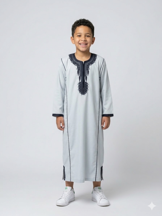 Colorful kids' kaftan by AL-ANDALUS with vibrant patterns, lightweight fabric, perfect for warm weather and casual wear.