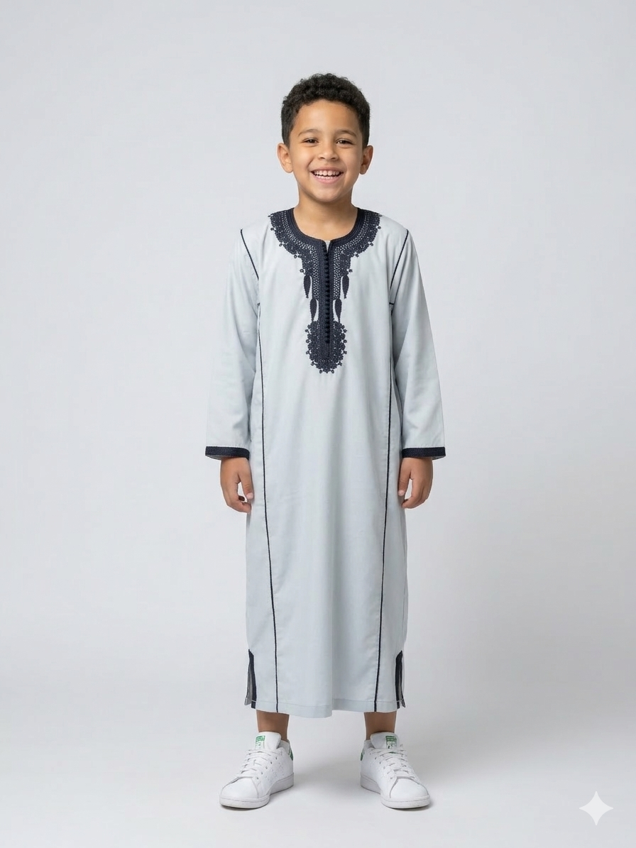 Colorful kids' kaftan by AL-ANDALUS with vibrant patterns, lightweight fabric, perfect for warm weather and casual wear.