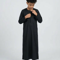 Colorful kids' kaftan by AL-ANDALUS featuring lightweight fabric and vibrant patterns for comfortable summer wear.