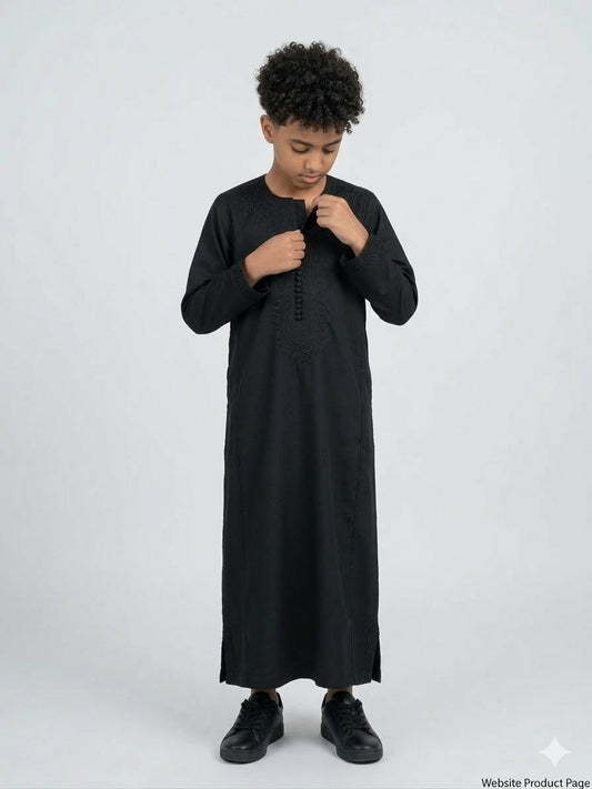 Colorful kids' kaftan by AL-ANDALUS featuring lightweight fabric and vibrant patterns for comfortable summer wear.