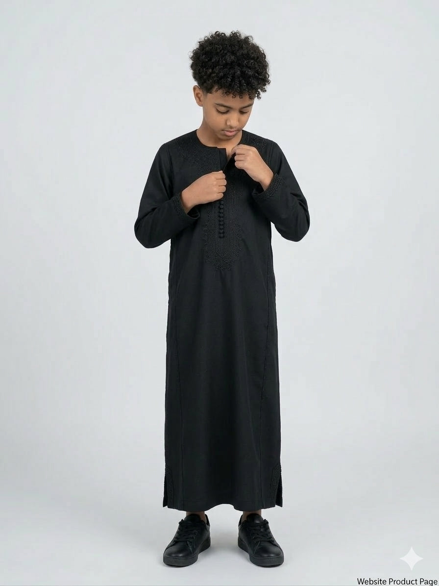 Colorful kids' kaftan by AL-ANDALUS featuring lightweight fabric and vibrant patterns for comfortable summer wear.