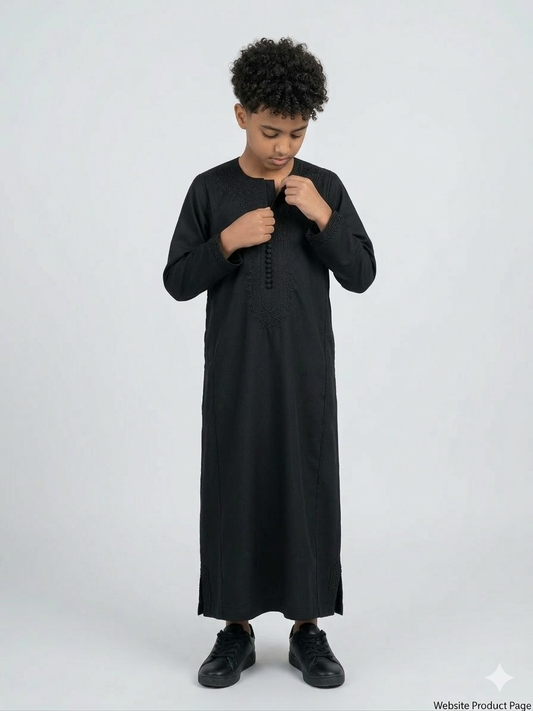 Colorful kids' kaftan by AL-ANDALUS featuring lightweight fabric and vibrant patterns for comfortable summer wear.