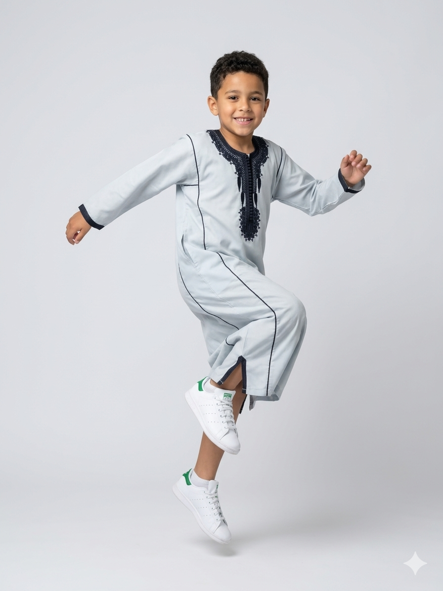 Colorful kids' kaftan by AL-ANDALUS featuring intricate patterns and lightweight fabric, perfect for comfortable summer wear.