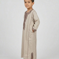 Colorful kids' kaftan by AL-ANDALUS featuring vibrant patterns and lightweight fabric, perfect for warm weather.