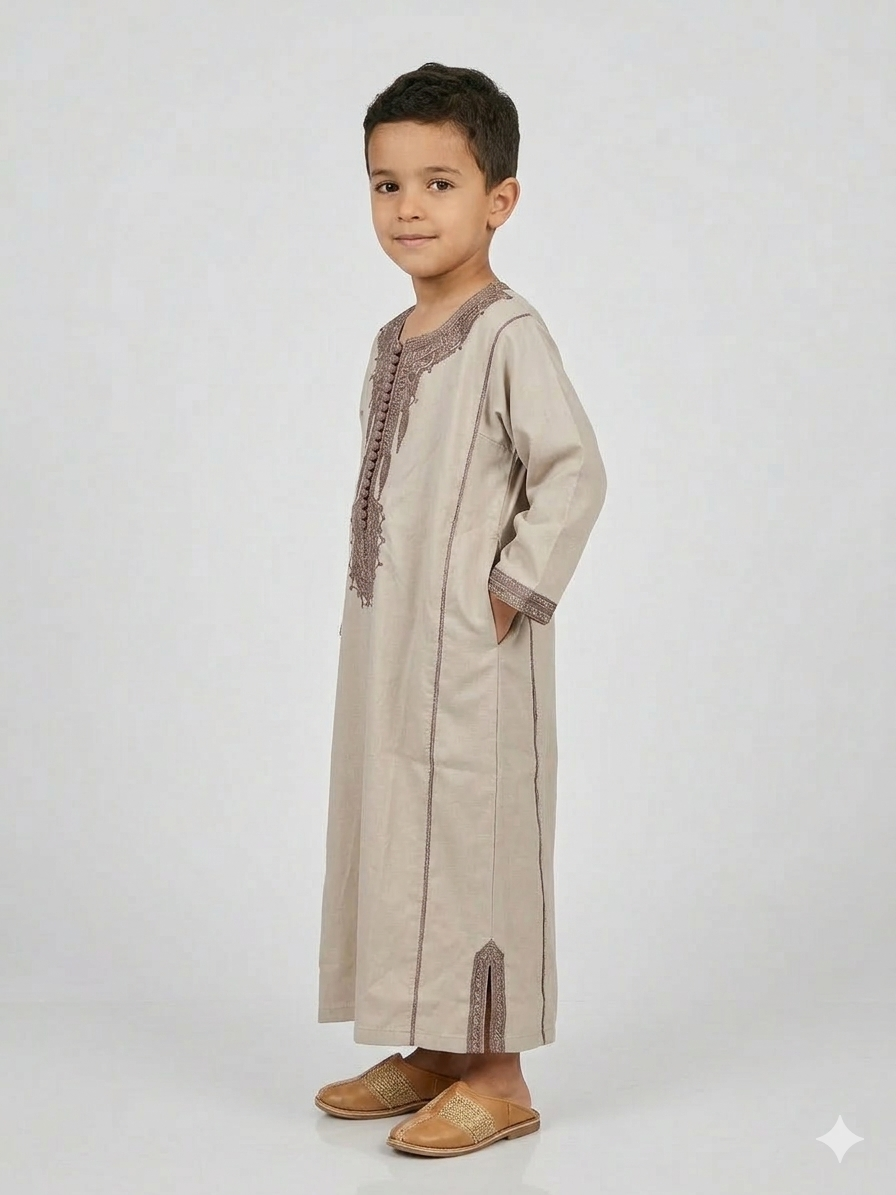 Colorful kids' kaftan by AL-ANDALUS featuring vibrant patterns and lightweight fabric, perfect for warm weather.
