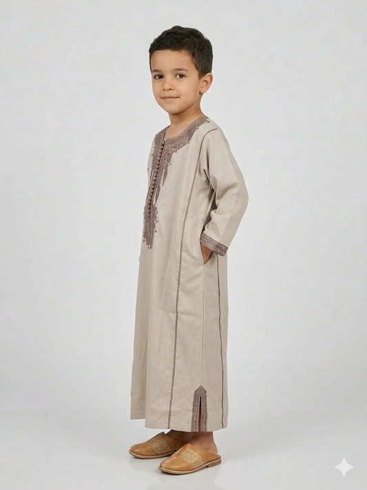 Colorful kids' kaftan by AL-ANDALUS featuring vibrant patterns and lightweight fabric, perfect for warm weather.