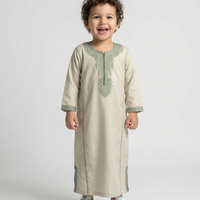 Children's colorful kids kaftan by AL-ANDALUS featuring vibrant patterns and lightweight fabric, perfect for warm weather.