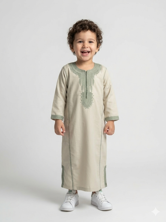 Children's colorful kids kaftan by AL-ANDALUS featuring vibrant patterns and lightweight fabric, perfect for warm weather.