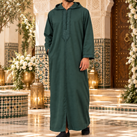 Green Soft Jellaba worn by a groom in a Moroccan riad wedding setting