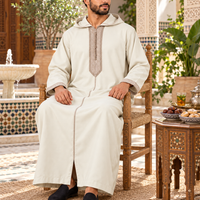 Off-White and Beige Soft Jellaba worn in a Moroccan courtyard on Eid morning